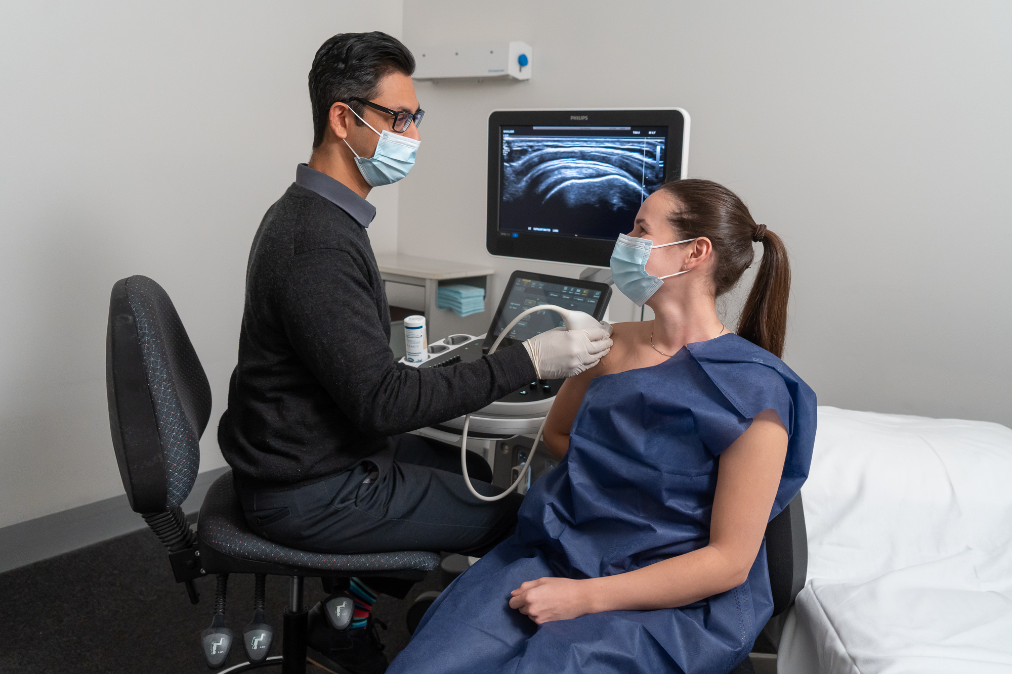 Doctor Doing Medical Ultrasound On Patient's Shoulder | Clinic Radiology Near Me | Direct Radiology 