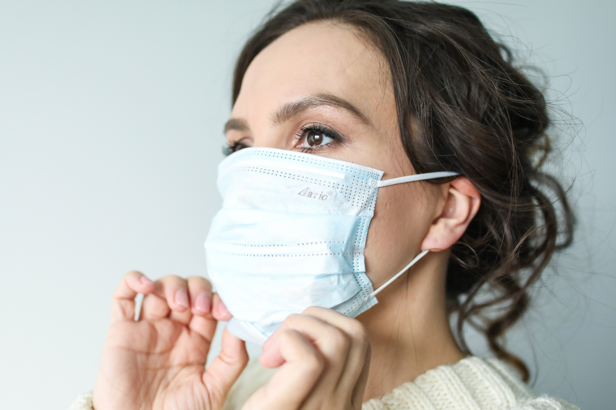 Female Wearing A Facemask To Stop The Spread of Virus | OPG Xray Near Me | Direct Radiology