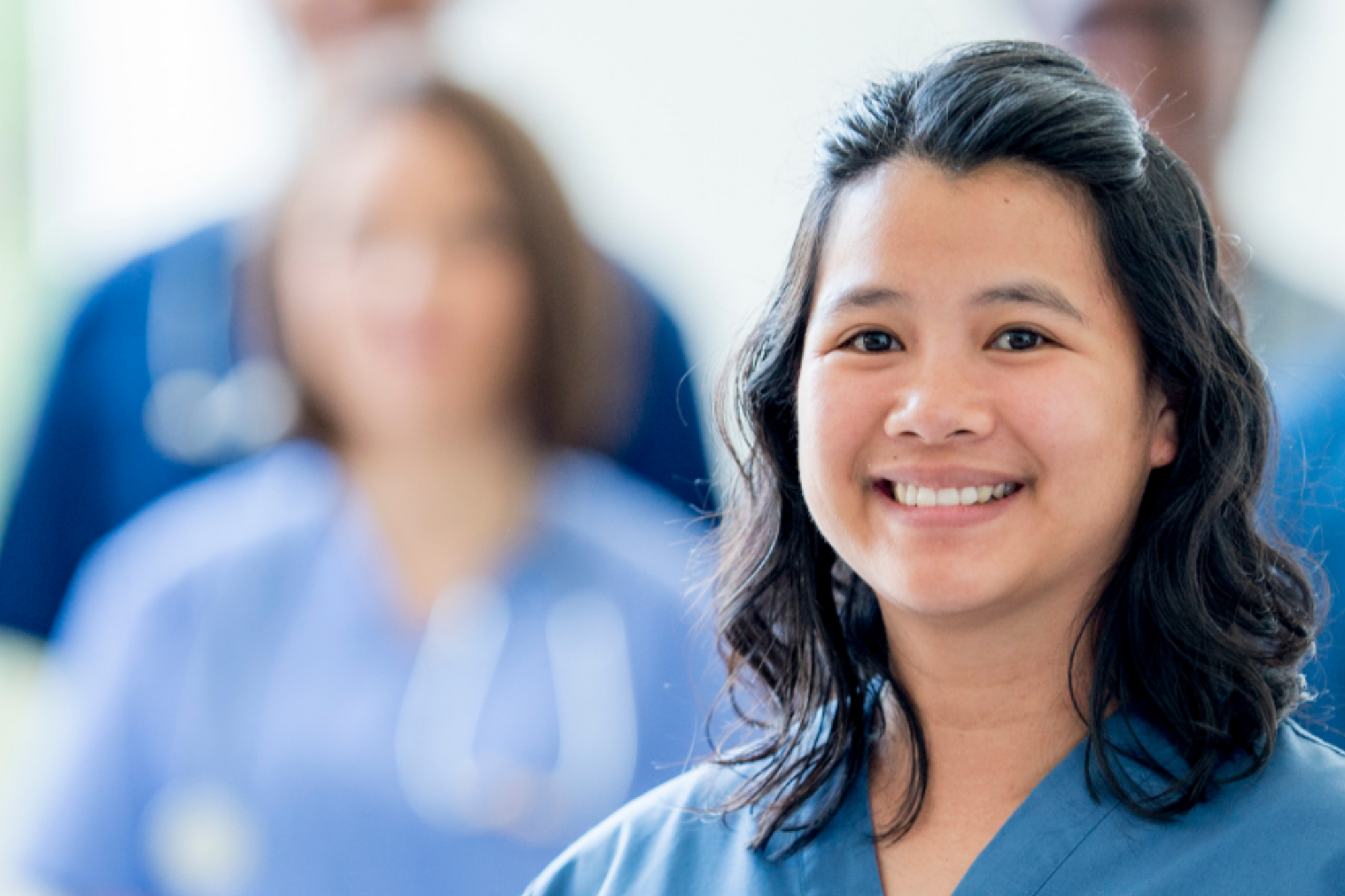 Woman Nurse Smiling with Blurred Background | Chest Xray | Breast Screening | Direct Radiology 