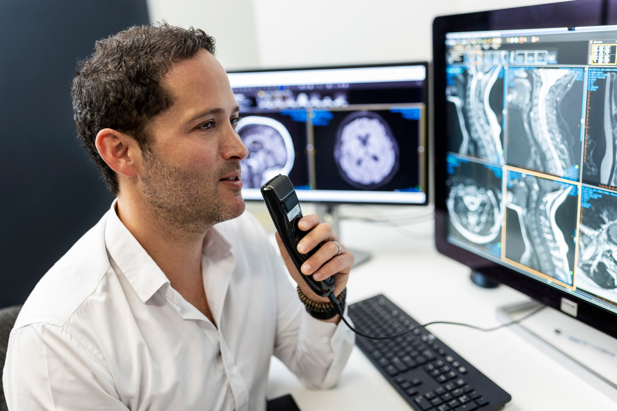 Doctor Announcing Something In front of Xray Screens | MRI Specialist Near Me | Direct Radiology